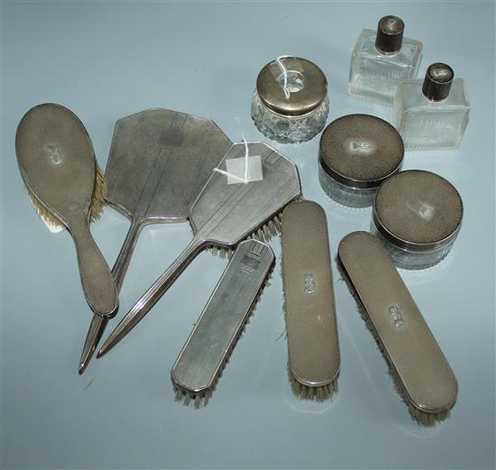 Seven-piece silver-mounted gentlemans dressing set, three-piece silver engine turned set and a hair tidy